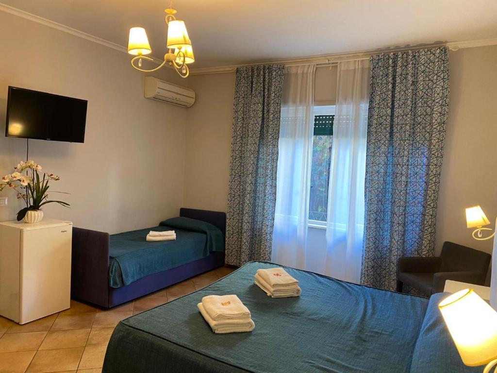 A bed or beds in a room at Domus Prati