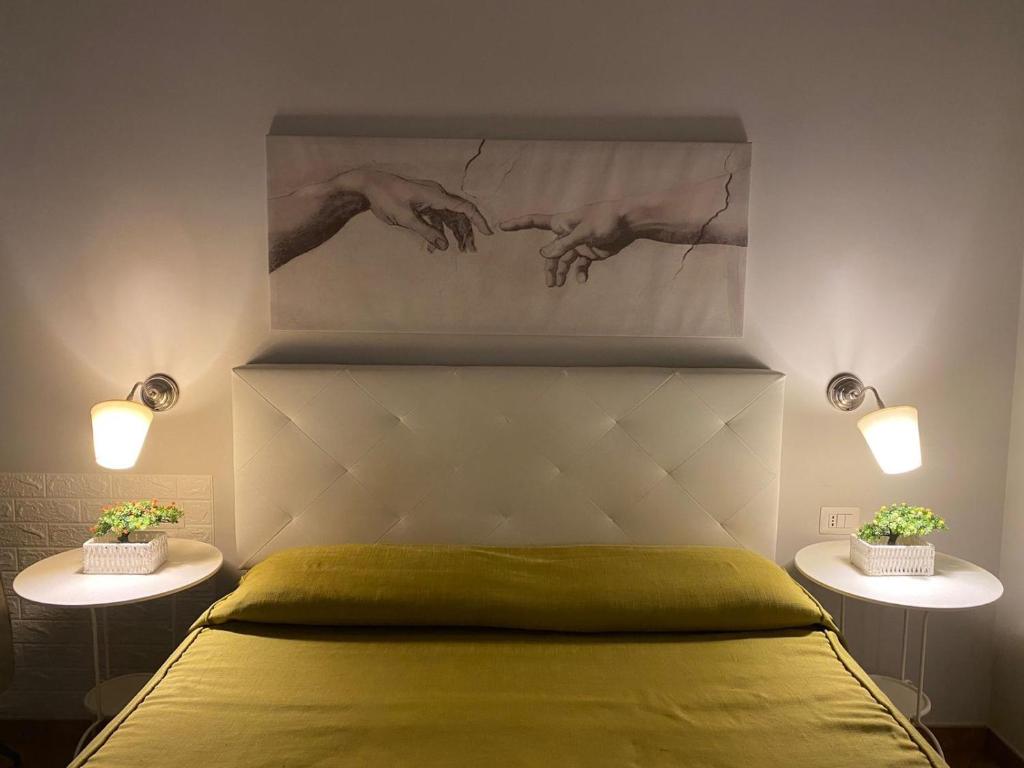 A bed or beds in a room at Domus Prati