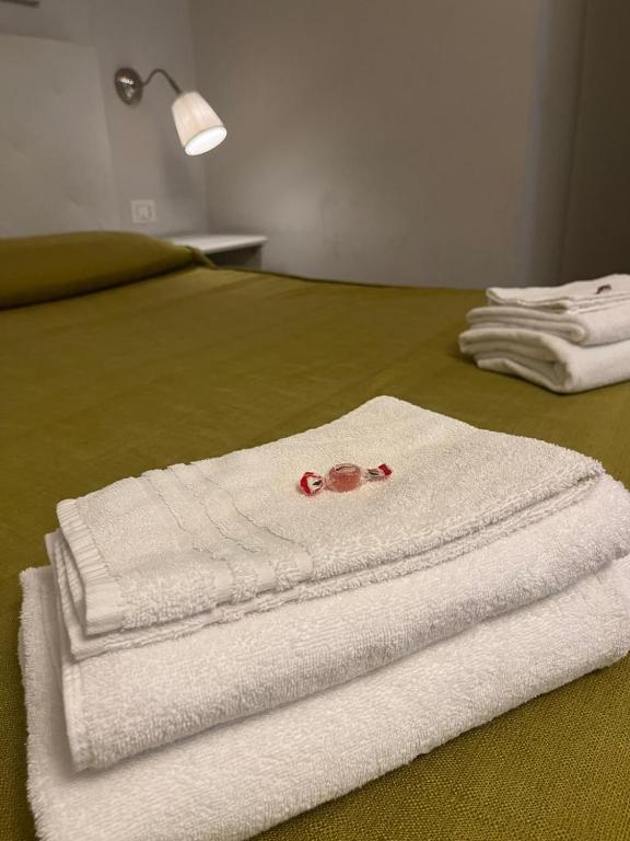 A bed or beds in a room at Domus Prati