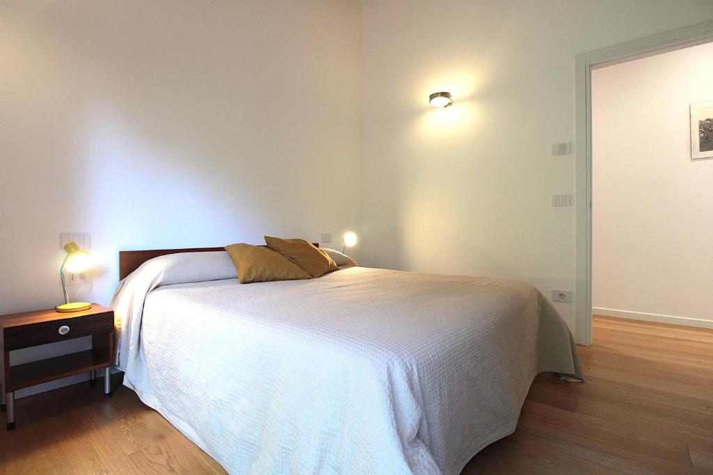 A bed or beds in a room at Casa Delle Eriche, Colli Euganei, Pool, Wifi