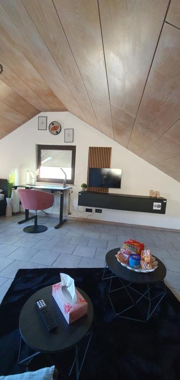 Posezení v ubytování 1 Zi DG-Apartment in Bad Friedrichshall-Jagstfeld