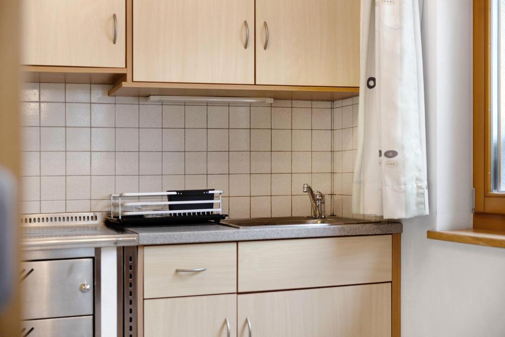 Kuchyň nebo kuchyňský kout v ubytování Bartlhof Refugium-Ritiro
