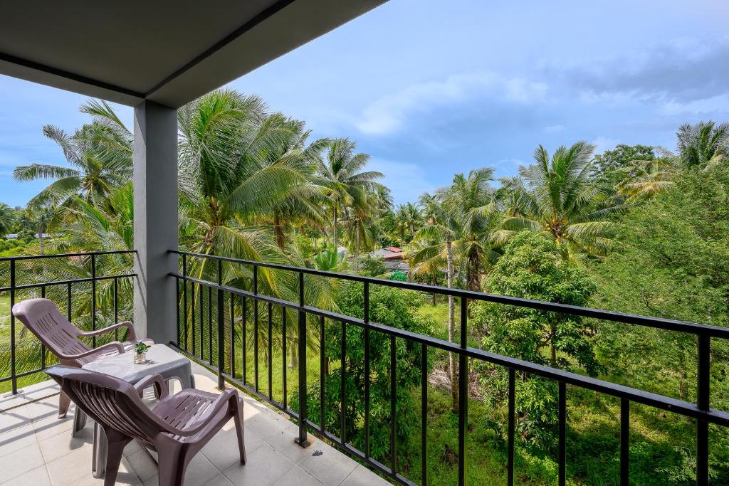 Balkón nebo terasa v ubytování Maikhao Hotel, Phuket