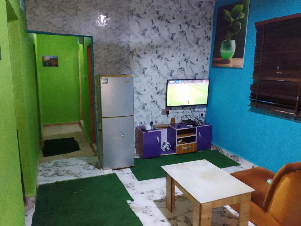 TV a/nebo společenská místnost v ubytování Xclusive Place