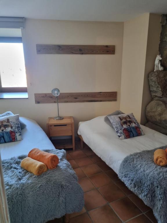Postel nebo postele na pokoji v ubytování Orri de Planès