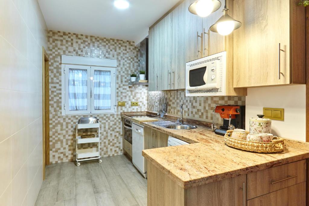 Kuchyň nebo kuchyňský kout v ubytování Casa Arroyo Colmenar