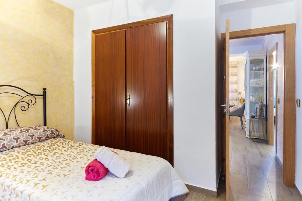 Postel nebo postele na pokoji v ubytování Casa Arroyo Colmenar