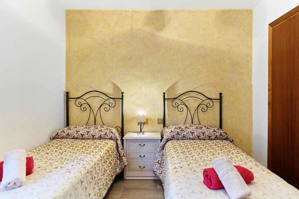 Postel nebo postele na pokoji v ubytování Casa Arroyo Colmenar