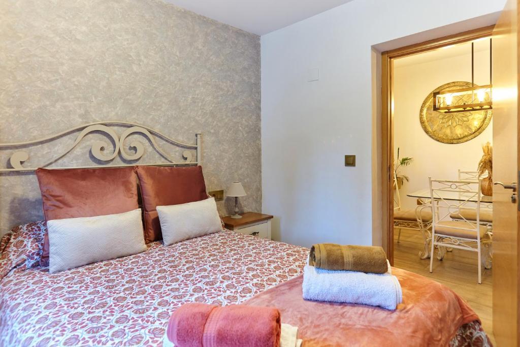 Postel nebo postele na pokoji v ubytování Casa Arroyo Colmenar