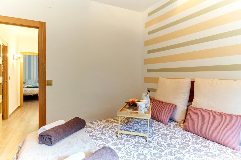 Postel nebo postele na pokoji v ubytování Casa Arroyo Colmenar