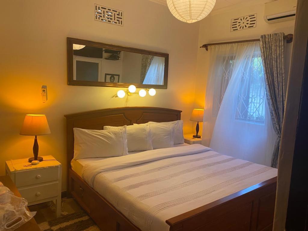 Postel nebo postele na pokoji v ubytování JDs Home