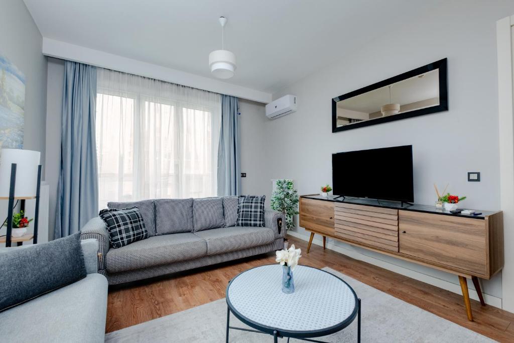TV a/nebo společenská místnost v ubytování Lux Residence 1 room 1 saloon