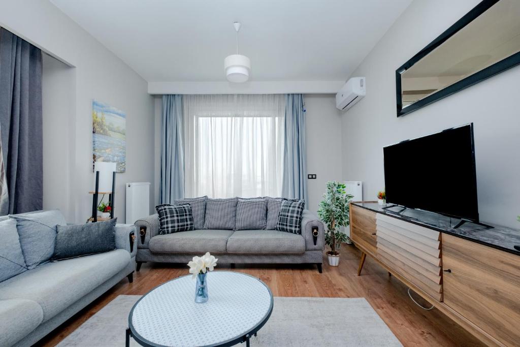TV a/nebo společenská místnost v ubytování Lux Residence 1 room 1 saloon