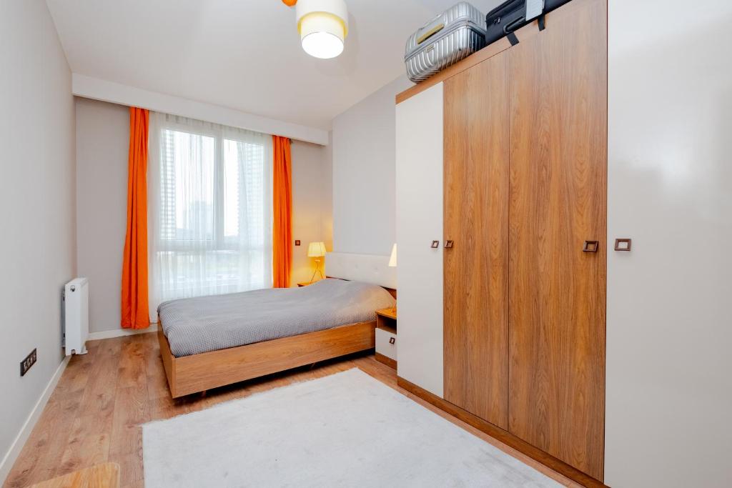 Postel nebo postele na pokoji v ubytování Lux Residence 1 room 1 saloon