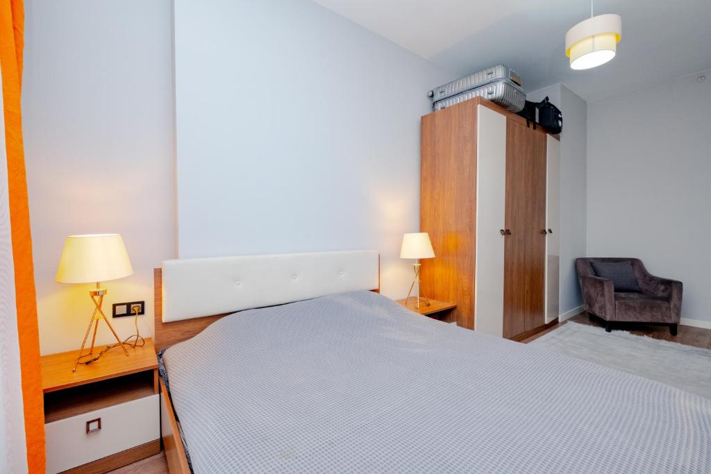 Postel nebo postele na pokoji v ubytování Lux Residence 1 room 1 saloon