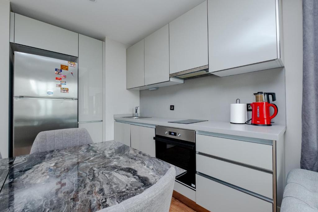 Kuchyň nebo kuchyňský kout v ubytování Lux Residence 1 room 1 saloon