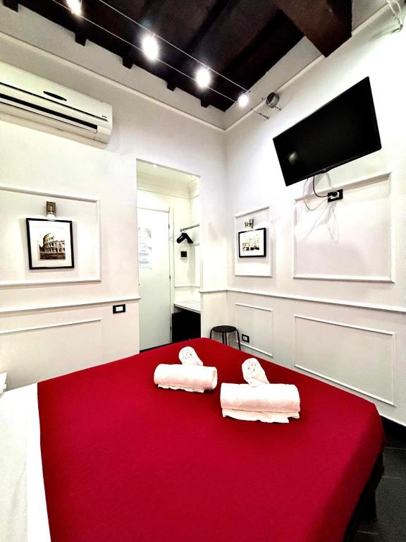 A bed or beds in a room at L'antica Locanda Dell'Orso