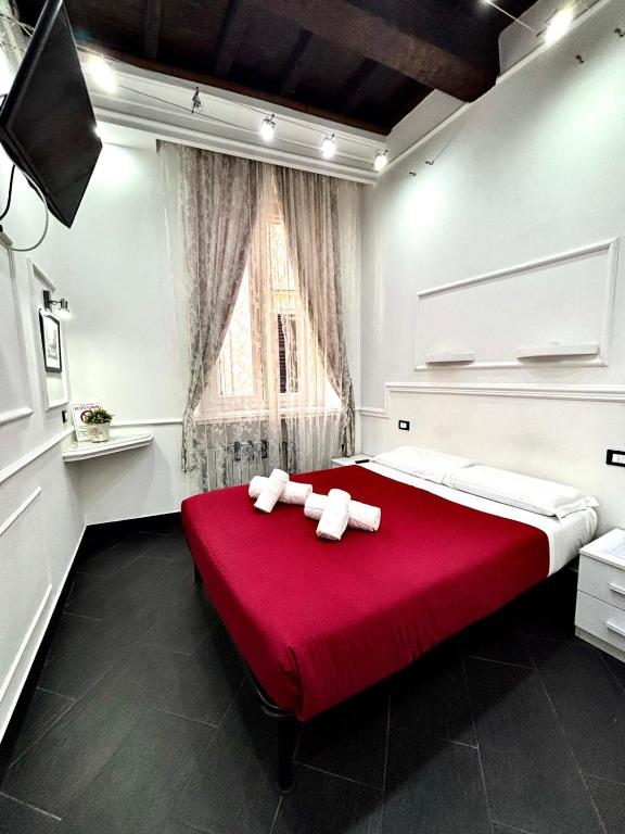 A bed or beds in a room at L'antica Locanda Dell'Orso