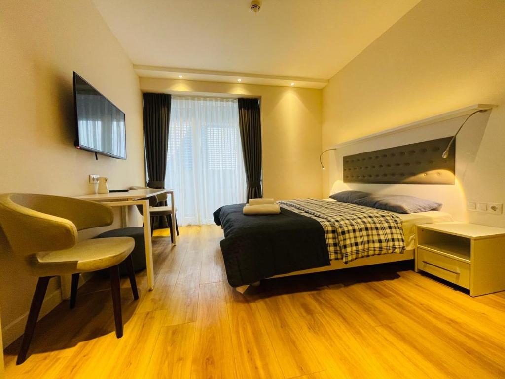 Postel nebo postele na pokoji v ubytování Alliance palace 18 floor