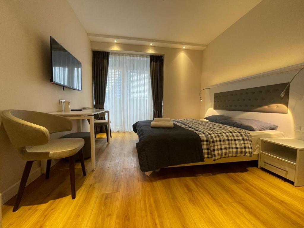Postel nebo postele na pokoji v ubytování Alliance palace 18 floor