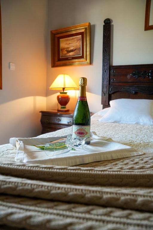 Postel nebo postele na pokoji v ubytování Hotel Rústico Fonteverde