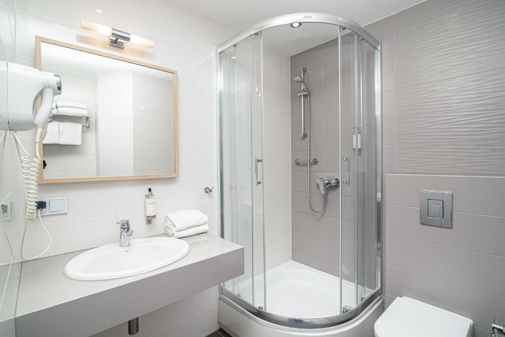 Koupelna v ubytování Antares Hotel