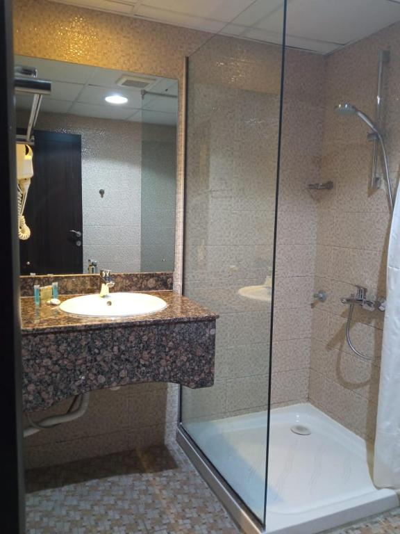 Koupelna v ubytování Asfar Hotel Apartments