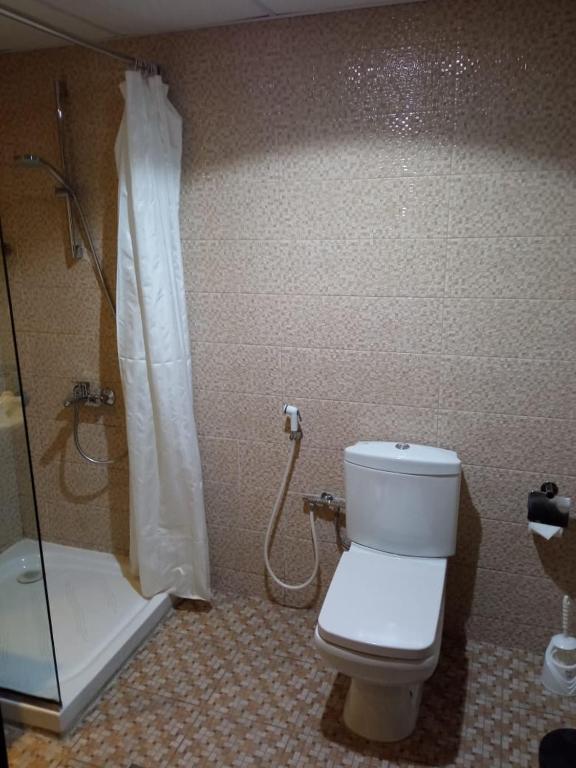 Koupelna v ubytování Asfar Hotel Apartments