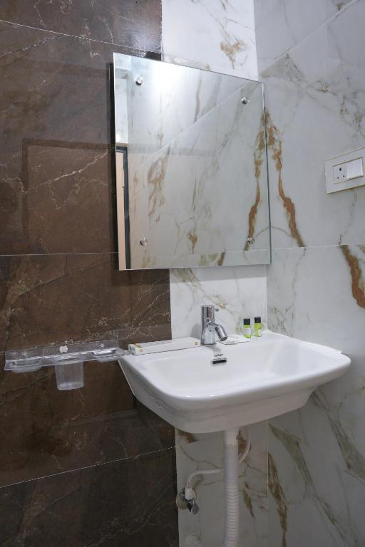 Koupelna v ubytování Hotel GSR Srinivasa Inn