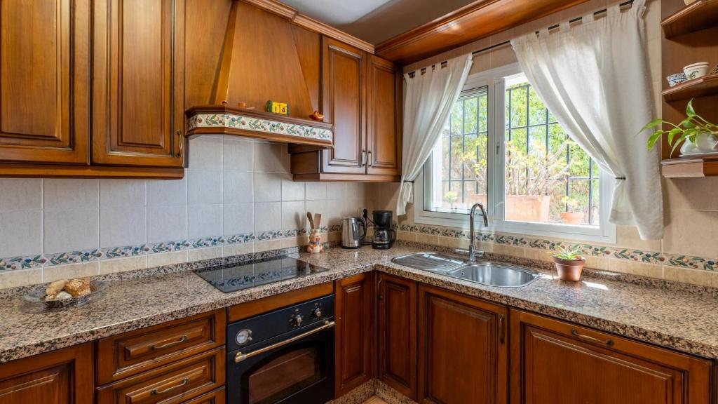 Kuchyň nebo kuchyňský kout v ubytování Casa Rocío