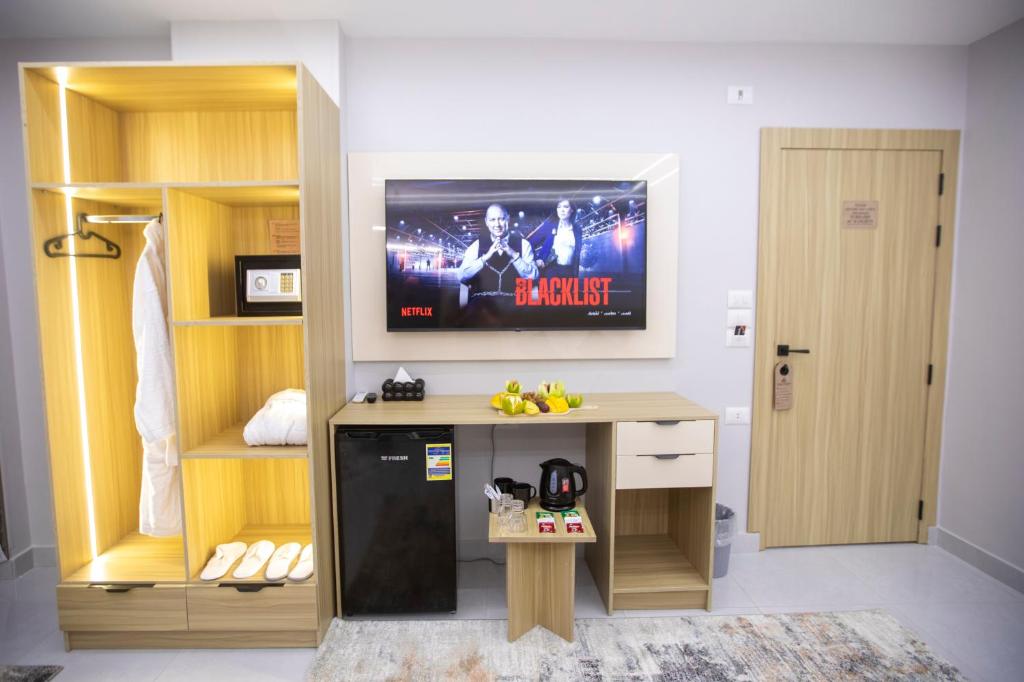 TV a/nebo společenská místnost v ubytování Royal Pyramids View Inn