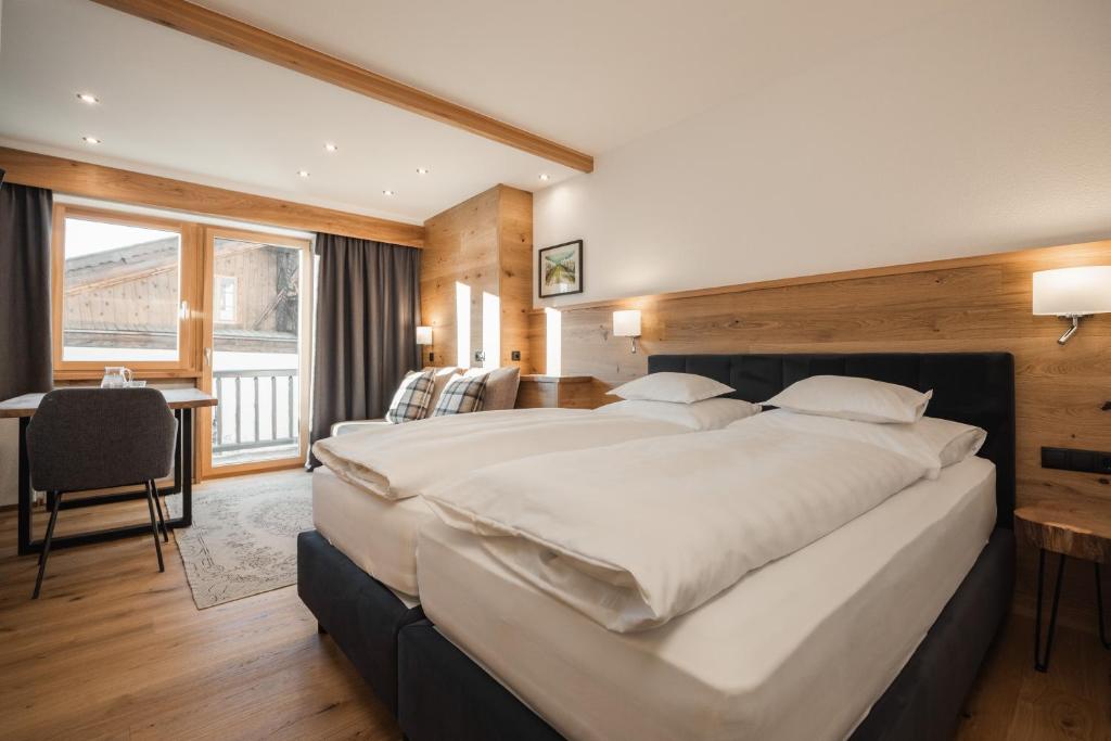 Postel nebo postele na pokoji v ubytování Jochum Hotel Garni