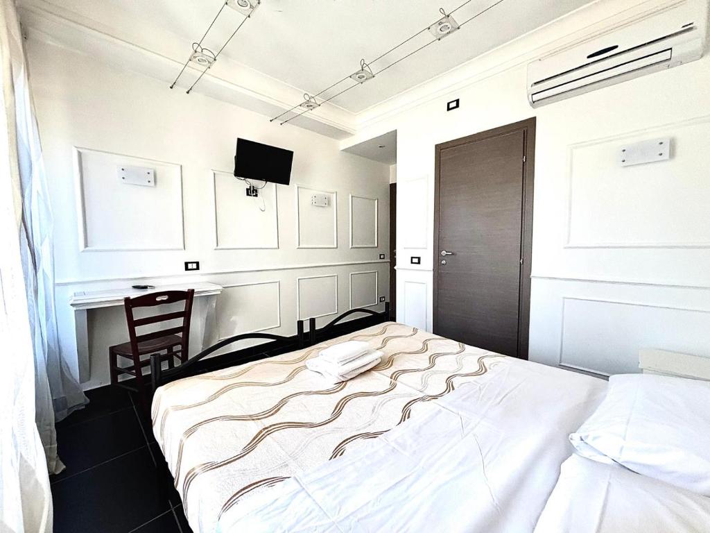 Cama o camas de una habitación en Palace Rome