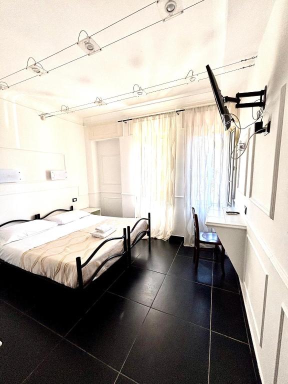 Cama o camas de una habitación en Palace Rome