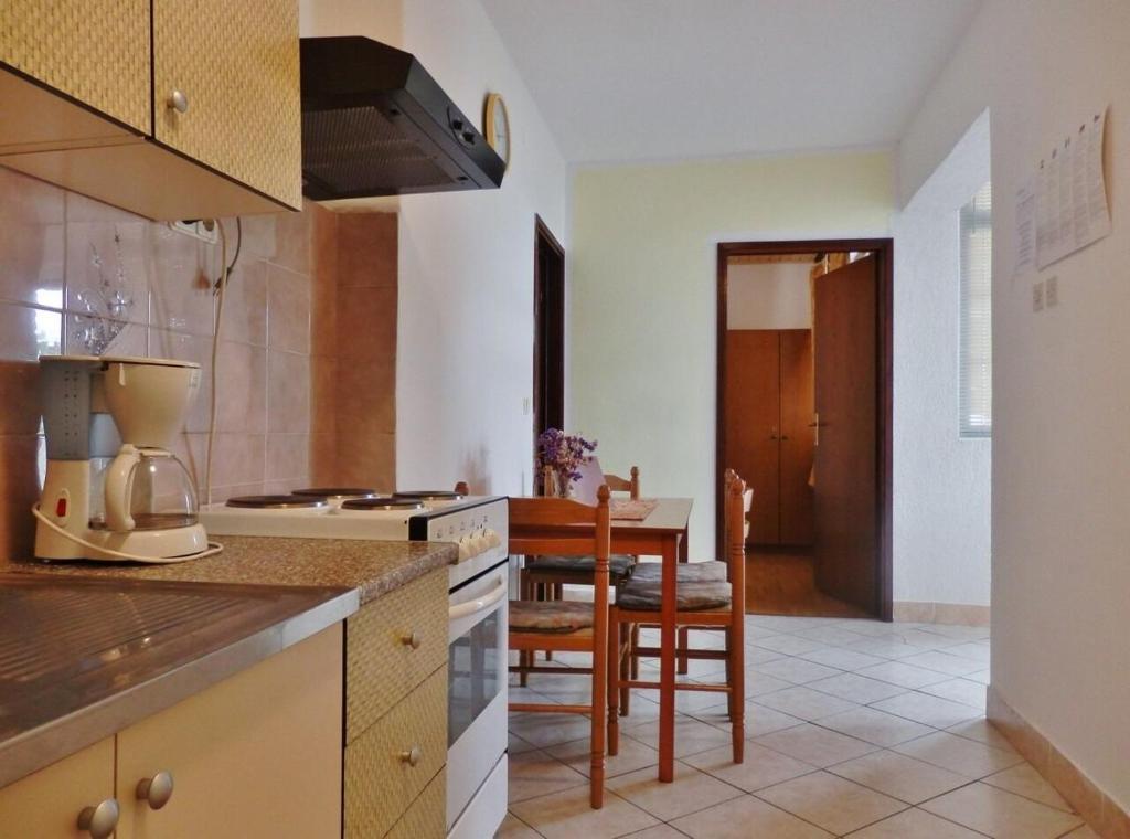 Kuchyňa alebo kuchynka v ubytovaní Apartments Makic