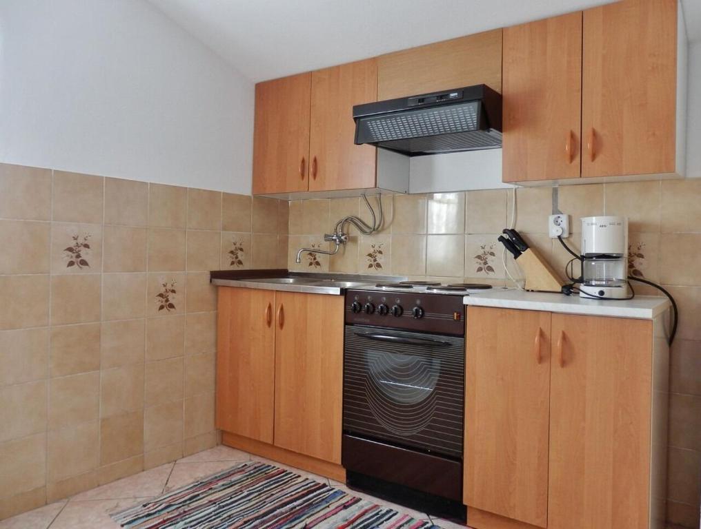 Kuchyňa alebo kuchynka v ubytovaní Apartments Makic