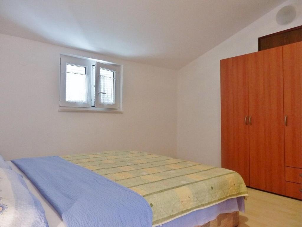 Posteľ alebo postele v izbe v ubytovaní Apartments Makic