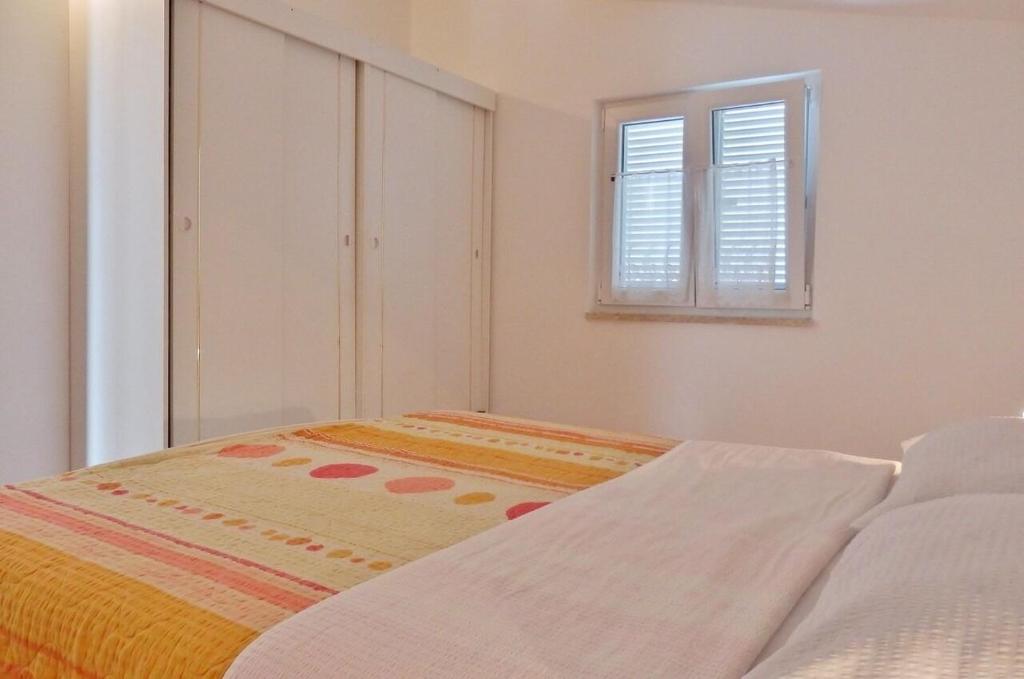 Posteľ alebo postele v izbe v ubytovaní Apartments Makic