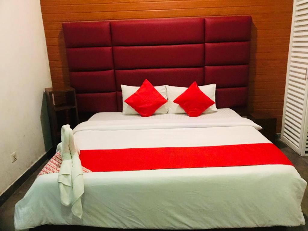 Postel nebo postele na pokoji v ubytování Airport Transit KINGS HOTEL