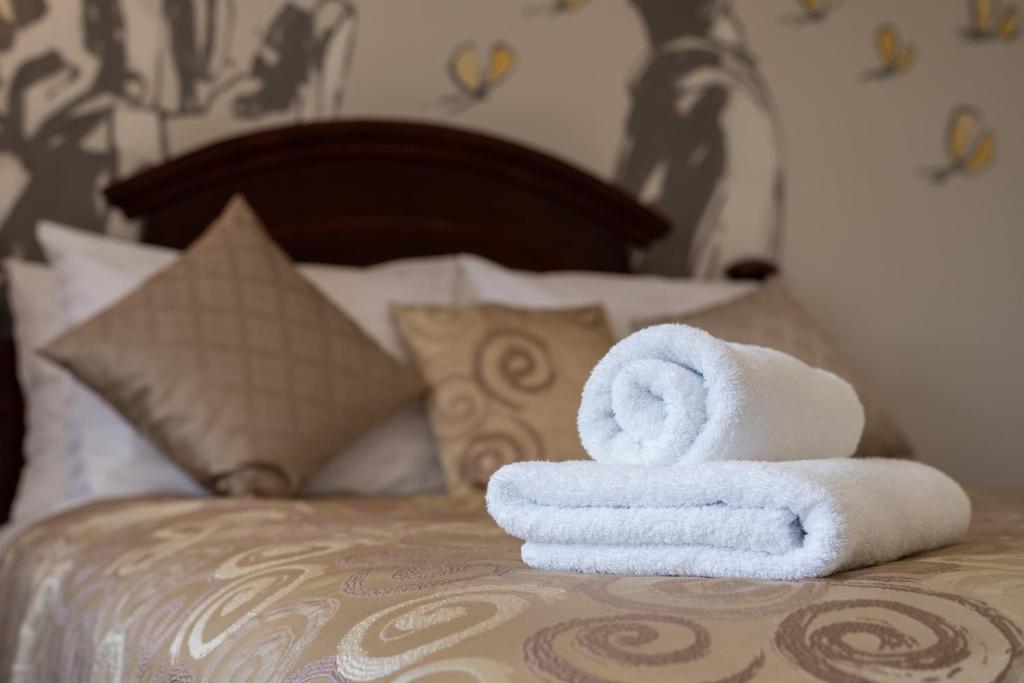 Posteľ alebo postele v izbe v ubytovaní Metropole Luxury Rooms Split