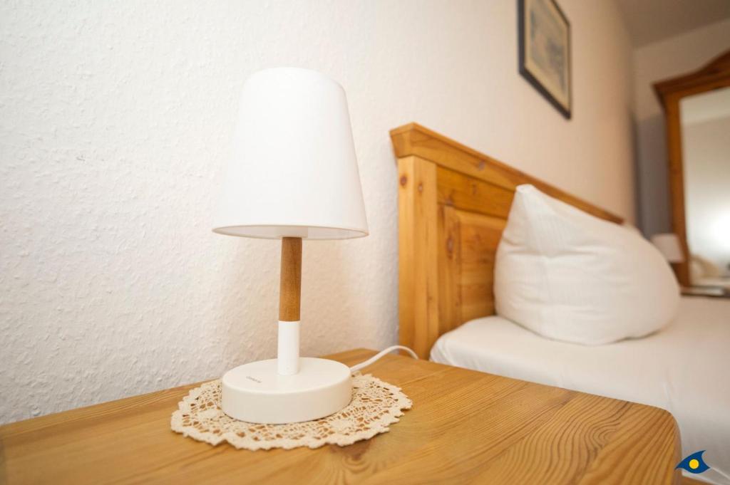 Postel nebo postele na pokoji v ubytování Villa Margot Whg 38