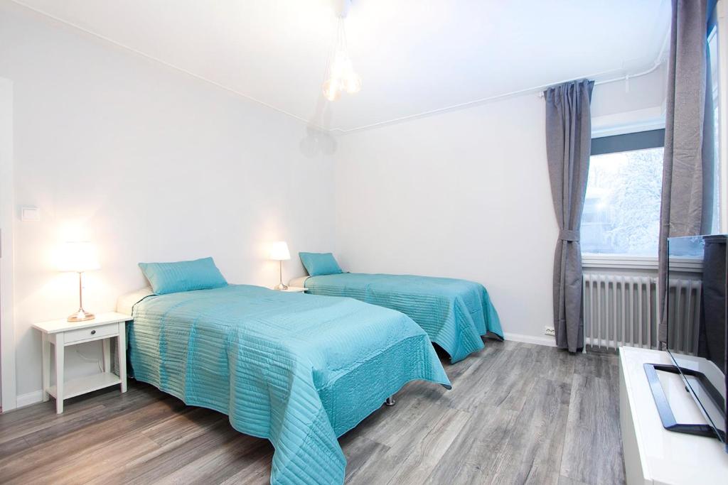 Postel nebo postele na pokoji v ubytování Nordurey Guesthouse