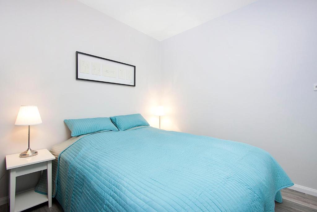 Postel nebo postele na pokoji v ubytování Nordurey Guesthouse