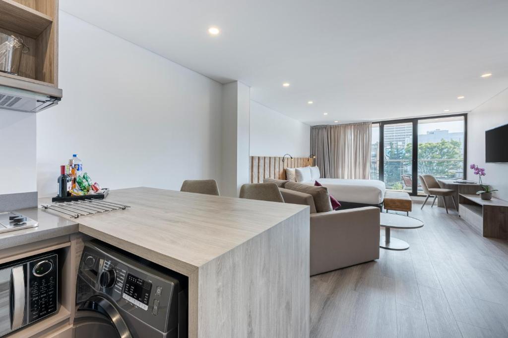 Kuchyň nebo kuchyňský kout v ubytování Hotel Jazz Apartments