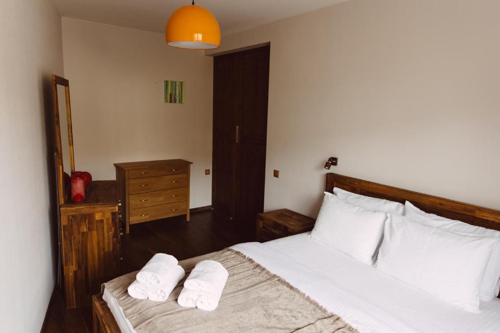 Postel nebo postele na pokoji v ubytování Snowline Haven New-Gudauri, Block-3