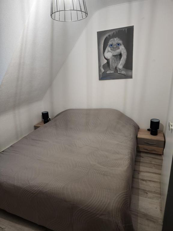 Postel nebo postele na pokoji v ubytování Gîte du logelbach