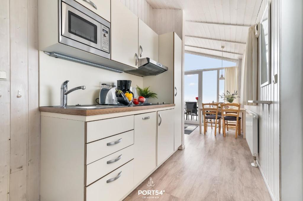 Η κουζίνα ή μικρή κουζίνα στο Ferienhaus Panoramablick 37 - Sankt Andreasberg im Harz