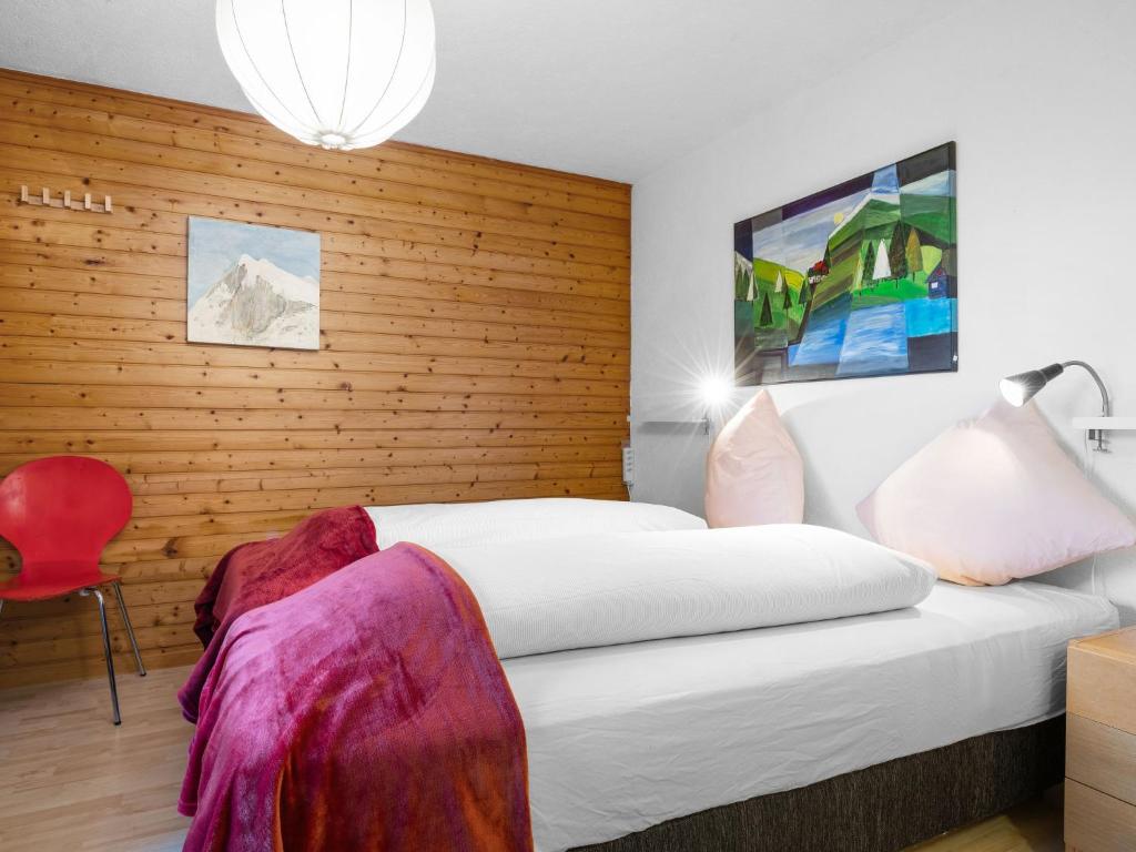 Postel nebo postele na pokoji v ubytování Chalet Rietsli by Interhome