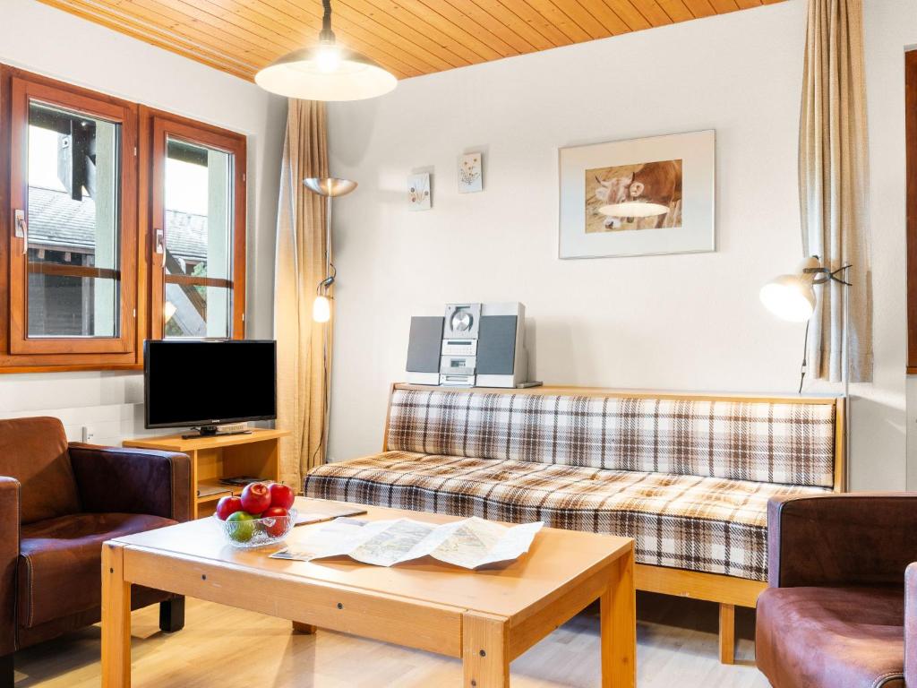 TV a/nebo společenská místnost v ubytování Apartment Aragon E112 by Interhome