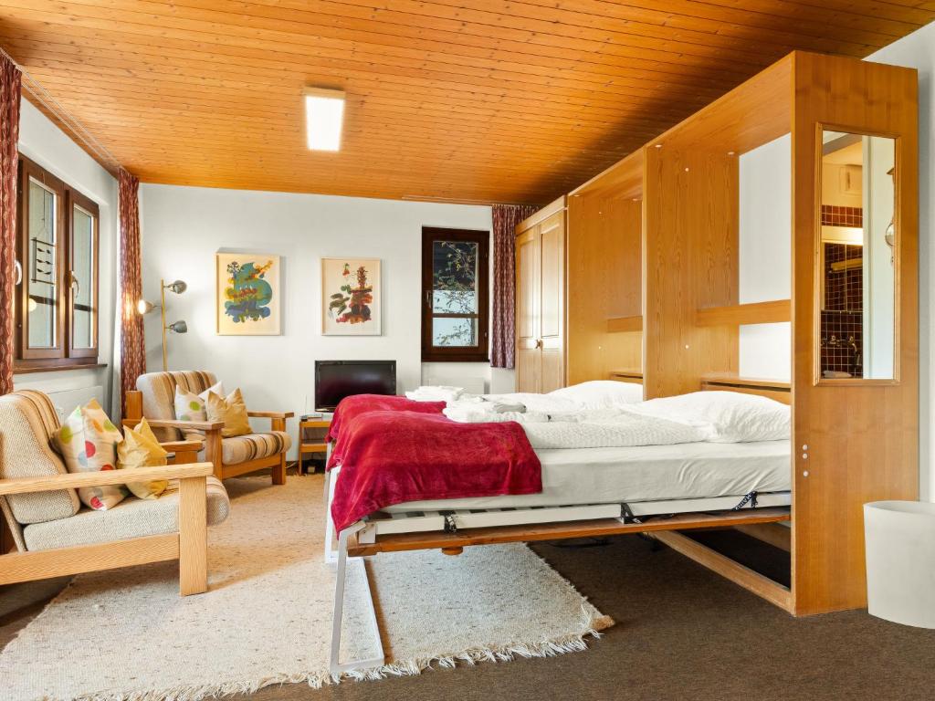 Postel nebo postele na pokoji v ubytování Apartment Aragon N103 by Interhome